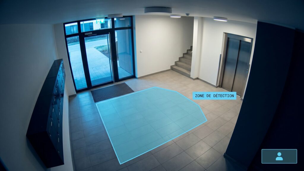 Hall d'immeuble avec zone de détection d'attroupement matérialisée.